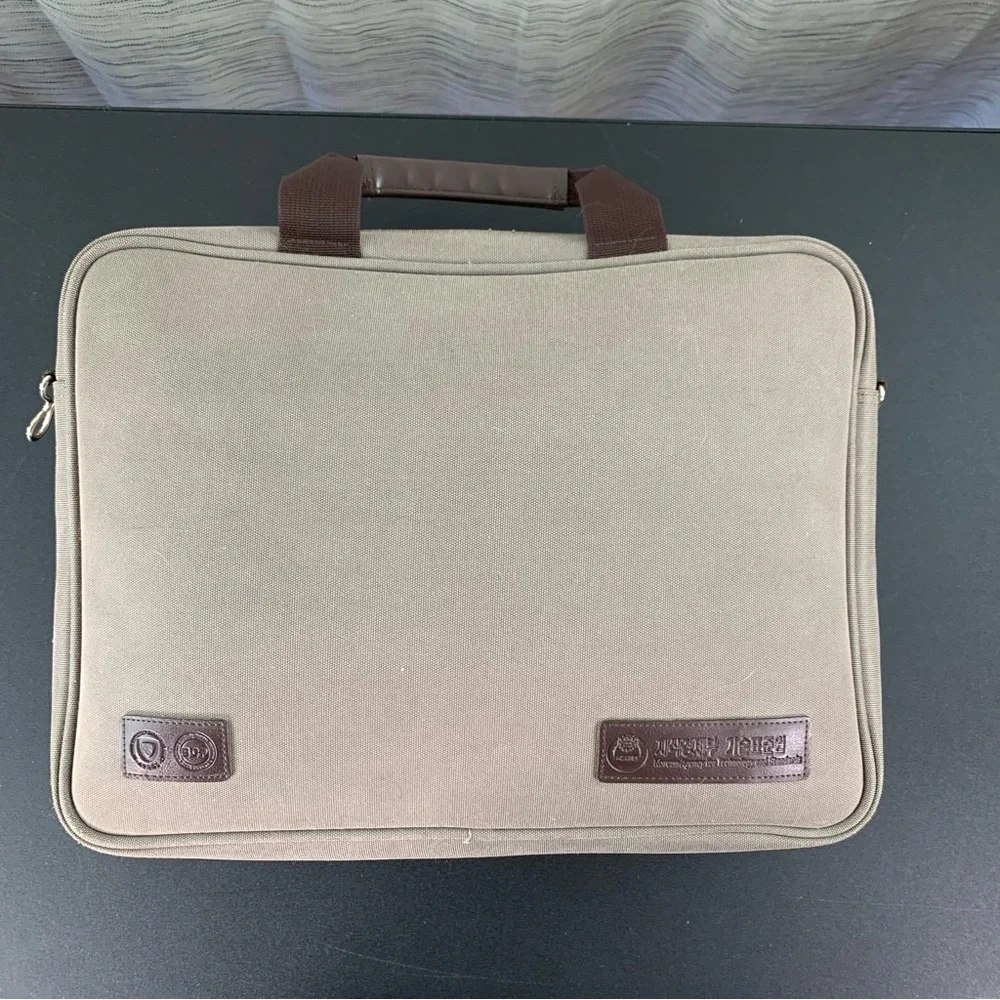 Golden Bell Tan and Brown Durable laptop bag with faux Leather Handle.